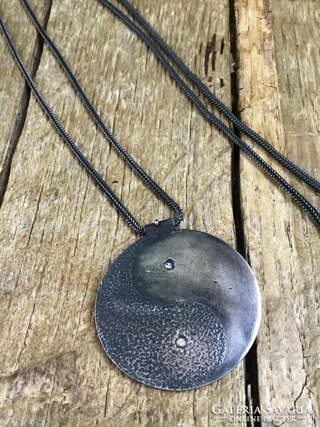 Old handmade yin and yang silver necklace with pendant and two brill stones.
