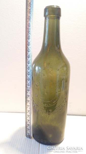 Old bottle denatured spirit labeled green glass