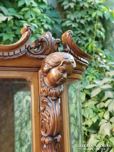 Sculpturally carved Neo-Renaissance antique display case