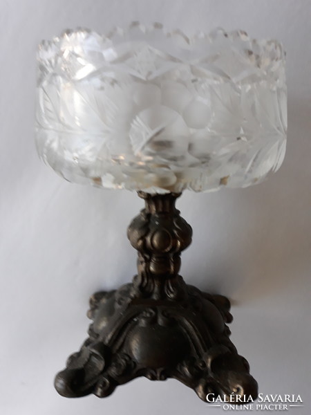 Antique table centerpiece with crystal bowl.