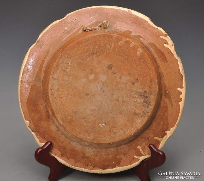 Large Torda wall plate from Transylvania, late 19th century, glazed earthenware, 28.3 cm.