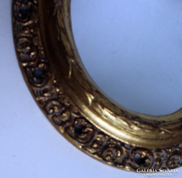 Mirror in a gilded wooden frame