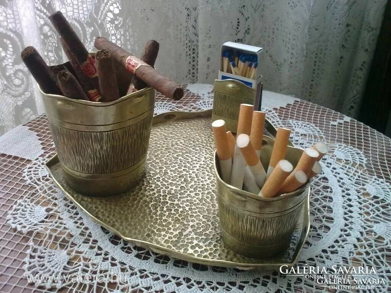 An antique copper desk centerpiece is also handmade