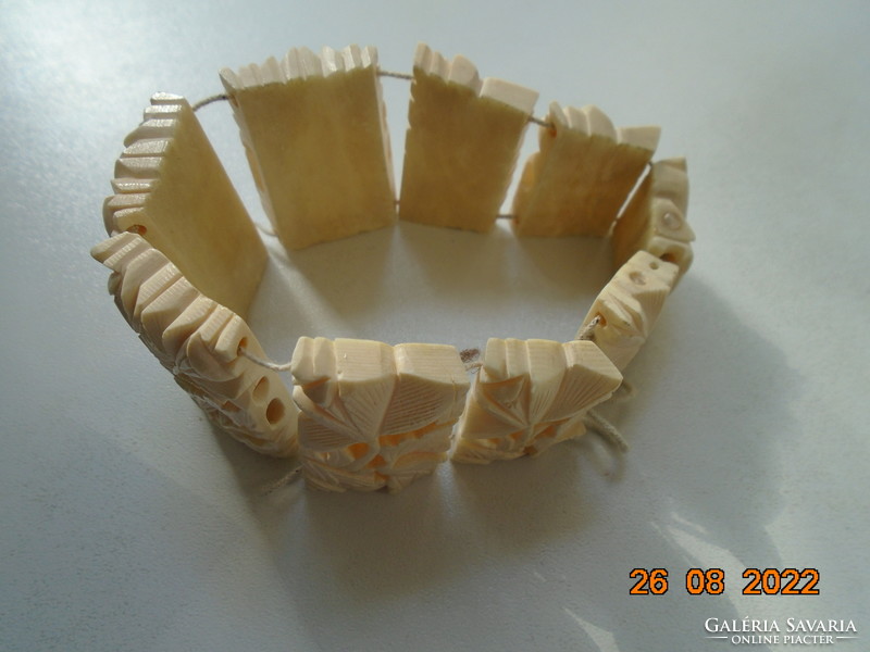 Antique, hand-carved bone, openwork oriental plant pattern wide bracelet