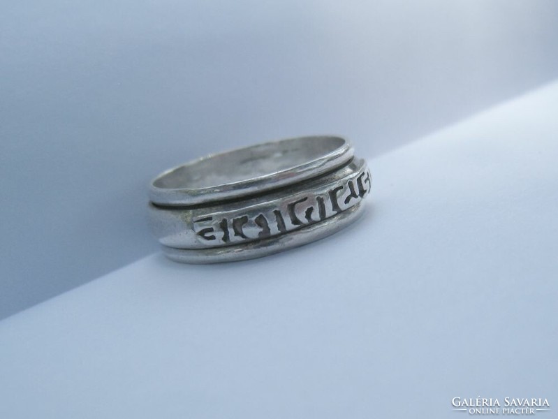 Silver ring with rotatable mantra and inscription