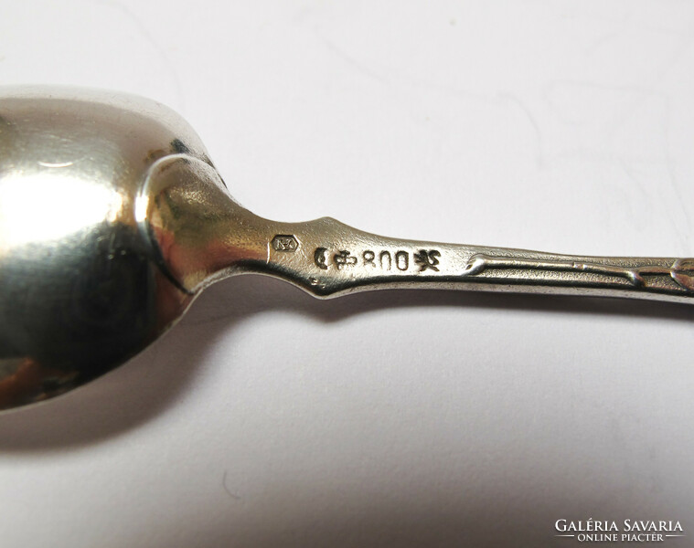 German silver spoons with an Asian pattern.