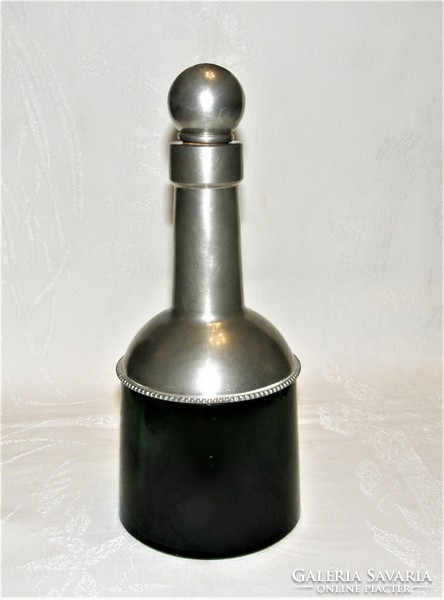 Old French tin covered glass bottle
