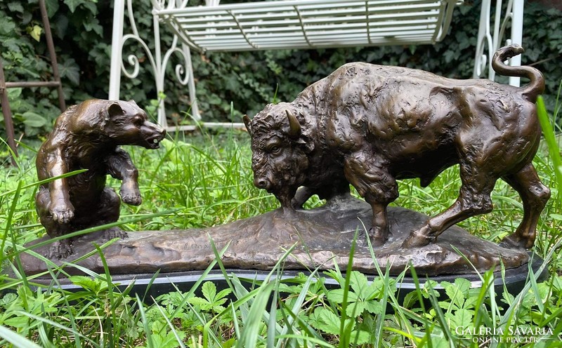 Bison and bear before fight - monumental bronze sculpture artwork