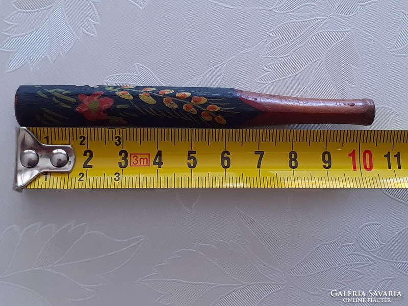 Old folk wooden snipe hand-crafted pipe with a painted flower motif