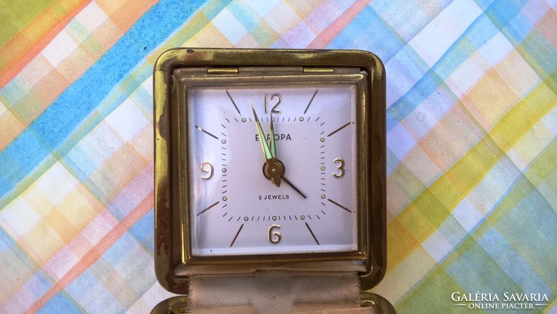 A rare, smaller-than-average size mechanical travel watch.