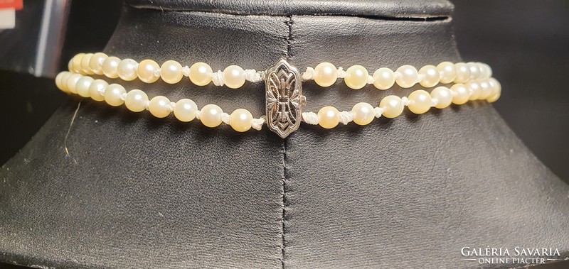 Double row of akoya pearls with gold clasp