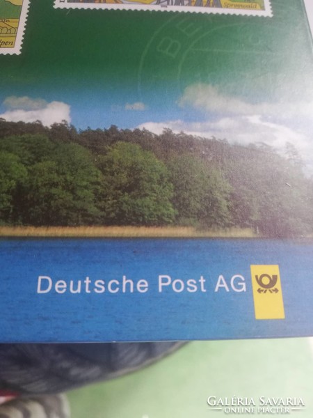 Német nyelvű képes útikönyv 18 db bélyeggel