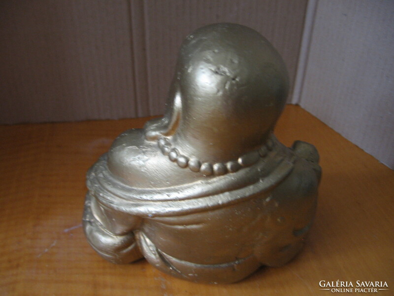 Buddha statue sitting, pot-bellied, smiling