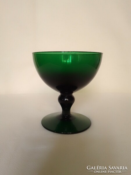 Beautiful, colorful, dark green glass goblet, drink, ice cream, decoration