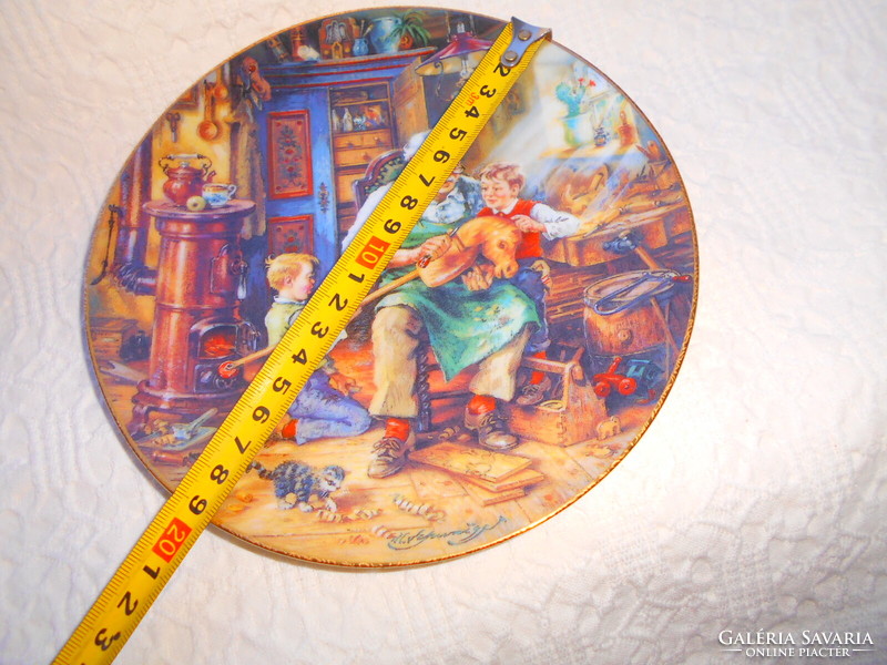 - Porcelain wall decorative plate with a family scene -- serially numbered, limited.