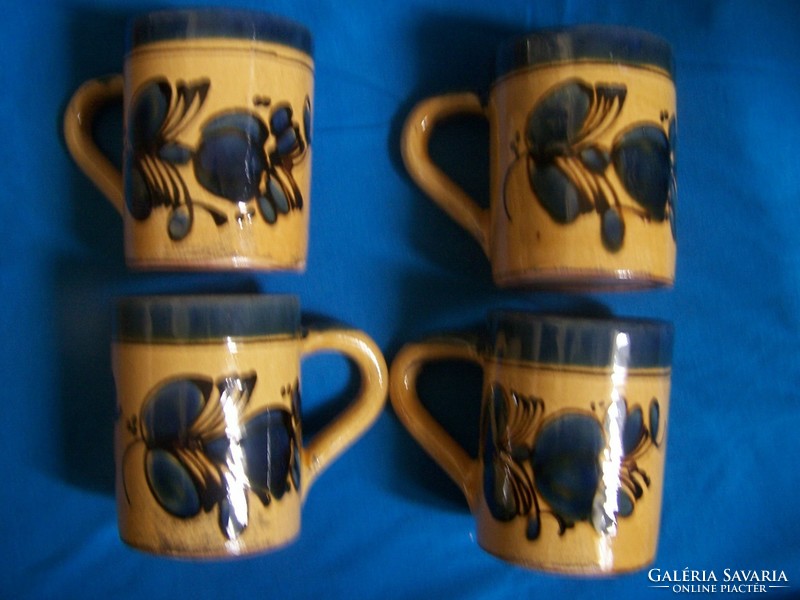 Four pieces of folk art ceramic mugs in flawless condition
