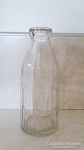 Régi tejes üveg bordás falú gólya mintás tejesüveg
