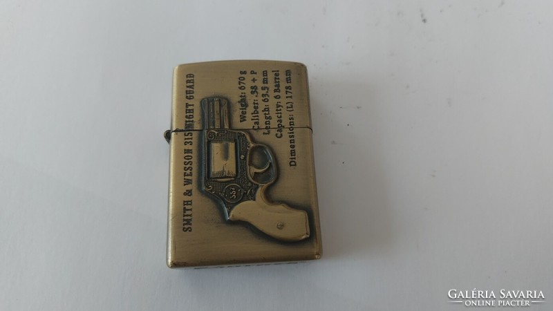 (K) cool petrol lighter, no petrol in it, gives a spark.