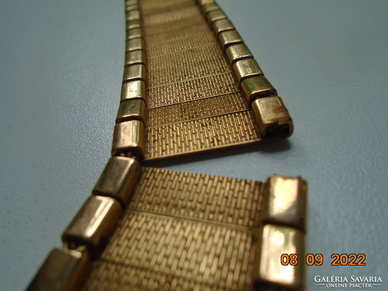 Art-deco wide bracelet textured with gold plate with flexible elements, e.g. Orl with g&k markings