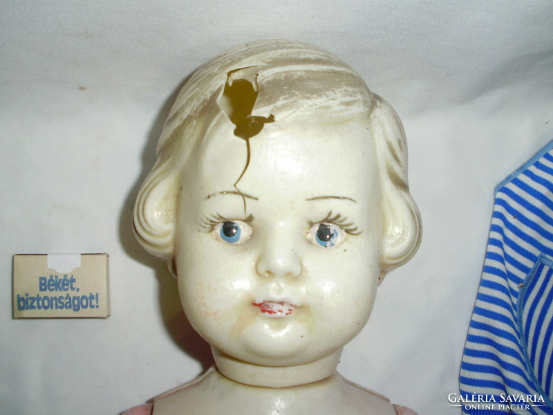 Old big toy doll - damaged
