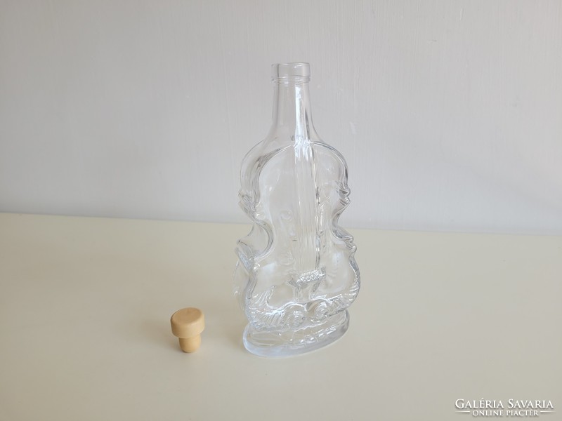 Retro old musical instrument violin shaped glass bottle