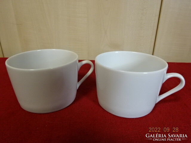White porcelain coffee cup, two pieces in one. He has! Jokai.