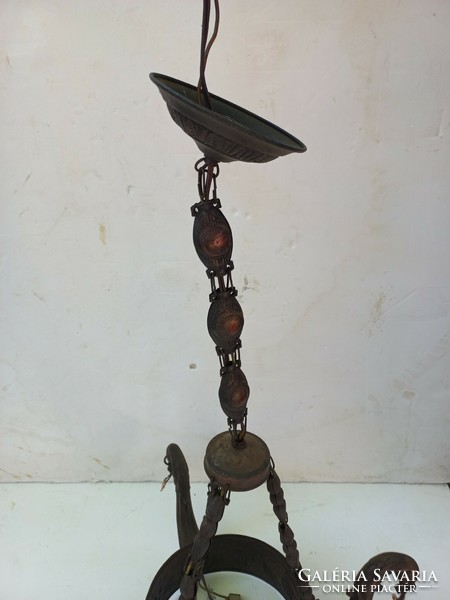 Two chandeliers in antique found condition. Teak and metal