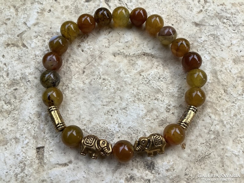 Amber colored agate mineral bracelet with elephant decoration