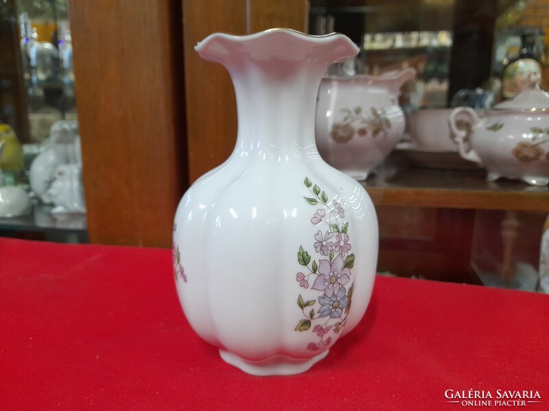 Zsolnay chipped porcelain vase with flower pattern.