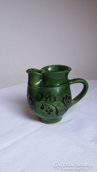 Old glazed folk ceramic small jug