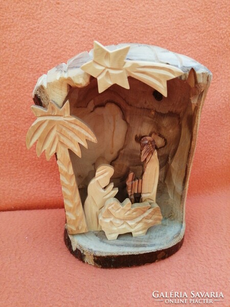 Hand-carved wooden manger. Decoration. Wood carving..Christmas decoration.