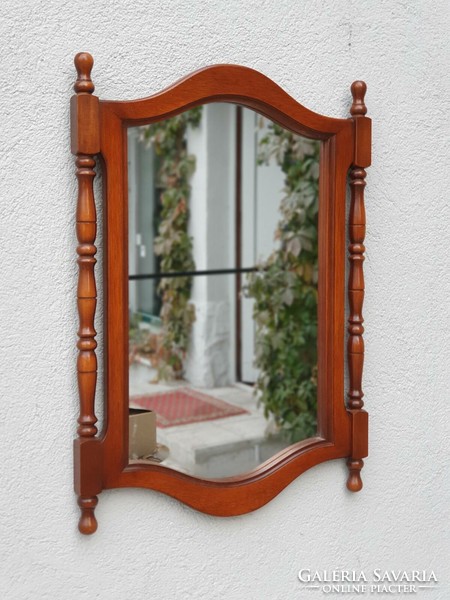 Nice old wooden framed wall mirror