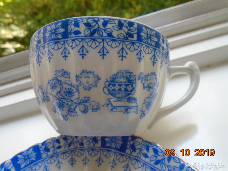 Antique teacup with coaster ribbed with 