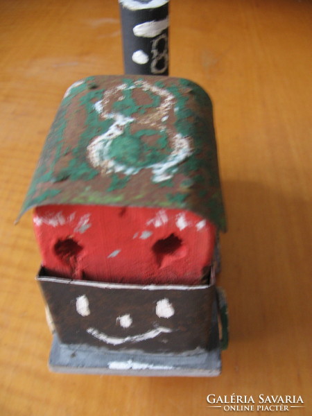 Handmade wooden and iron toy locomotive
