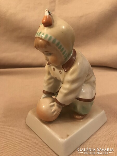 Zsolnay porcelain statue of a boy playing ball with a shield seal