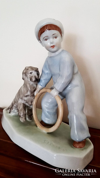 Old zsolnay porcelain hammer sculpture with hoop boy dog