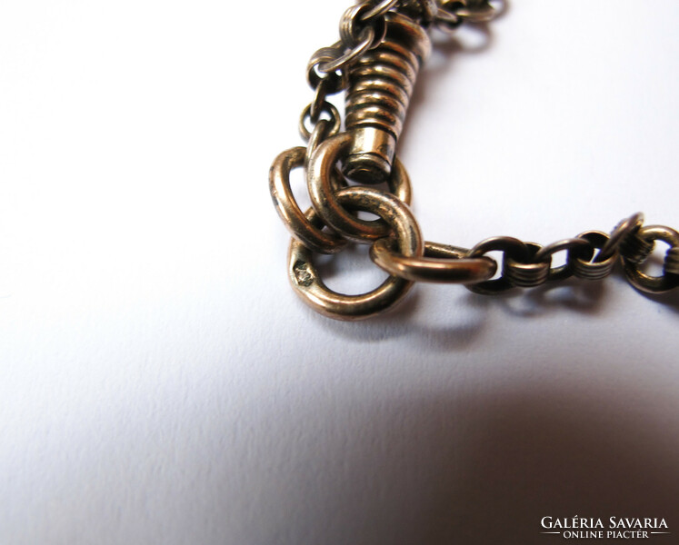 Gold-plated silver pocket watch chain? With padlock and key pendants.