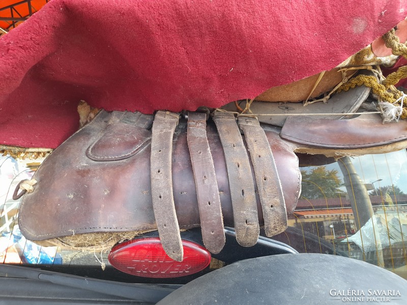 Saddle decorated with old fabric. Eastern?