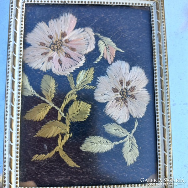 Small embroidered picture in a copper frame