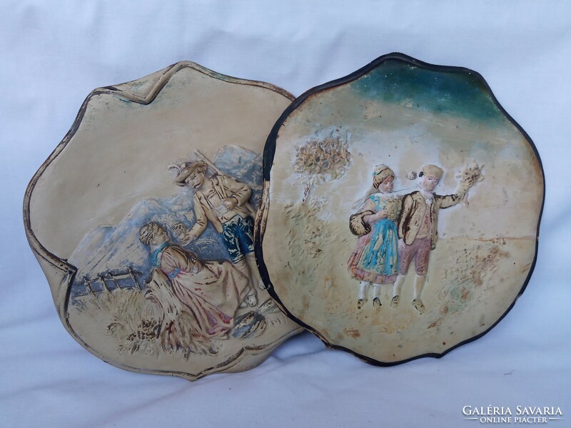 The xix-xx. Two, fired ceramic, hand-painted decorative plates from the turn of the century