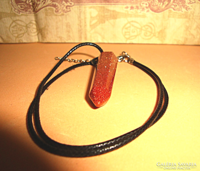 Golden sandstone reiki chakra pendant, hexagonal bar, on waxed leather thread
