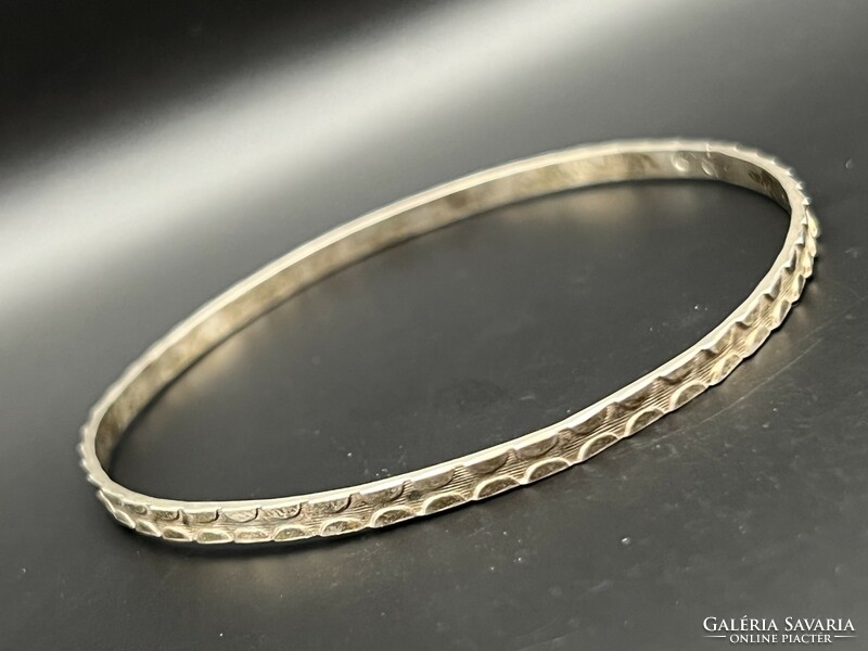 Silver bracelet with semicircle pattern