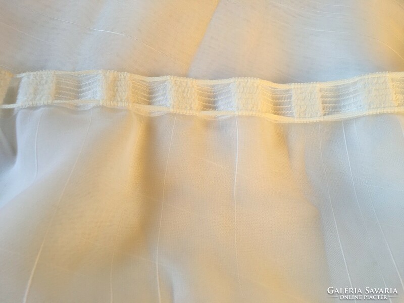 2 pcs of white voile curtains with a solid stripe pattern woven in them