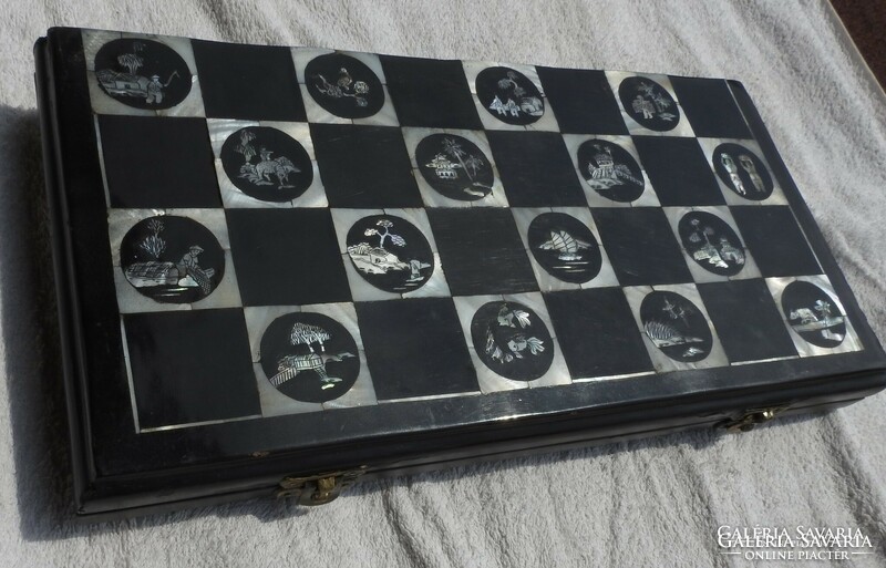 Antique oriental chess set with pearl board with bone-shaped wooden figures