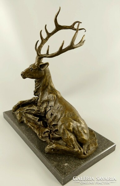 Resting deer - monumental bronze sculpture