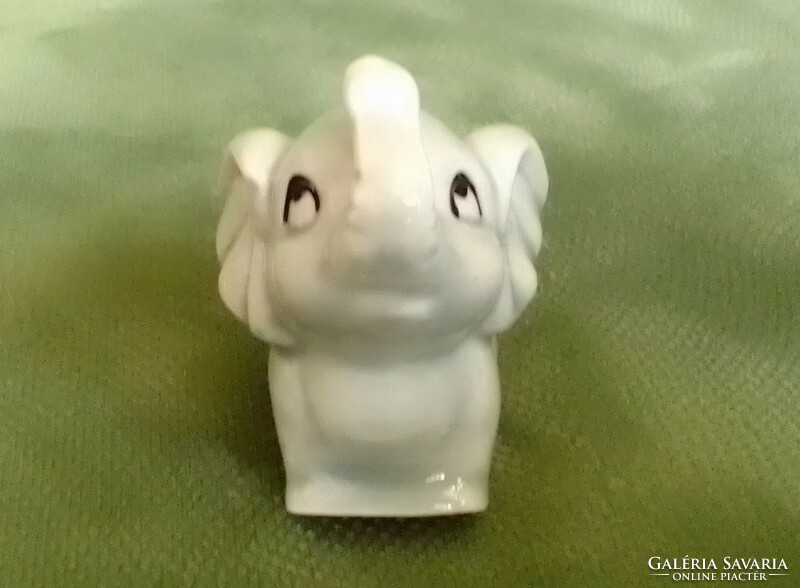 Lovely, small, raised trunk porcelain elephant figure, sculpture, hand painted