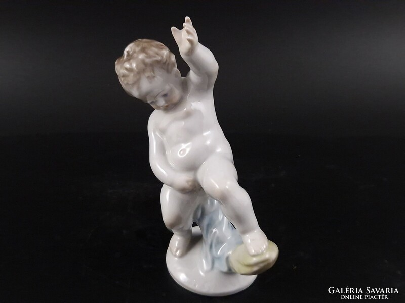 Herend peeing putto figure