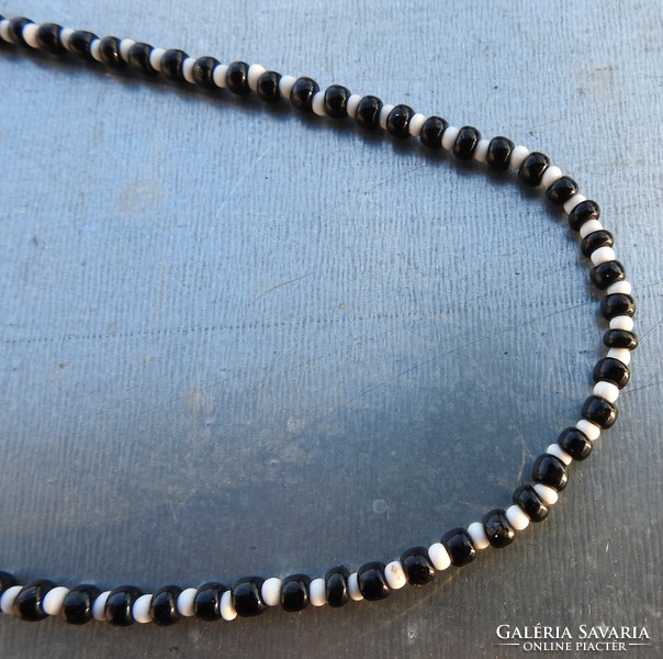 Black - white string of pearls necklace