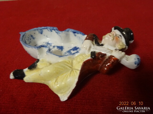 German porcelain centerpiece with a musical figure on the side. He has! Jokai.