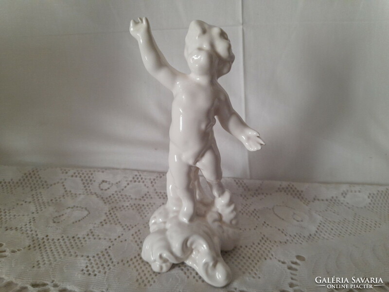 Unmarked ceramic or porcelain putto statue